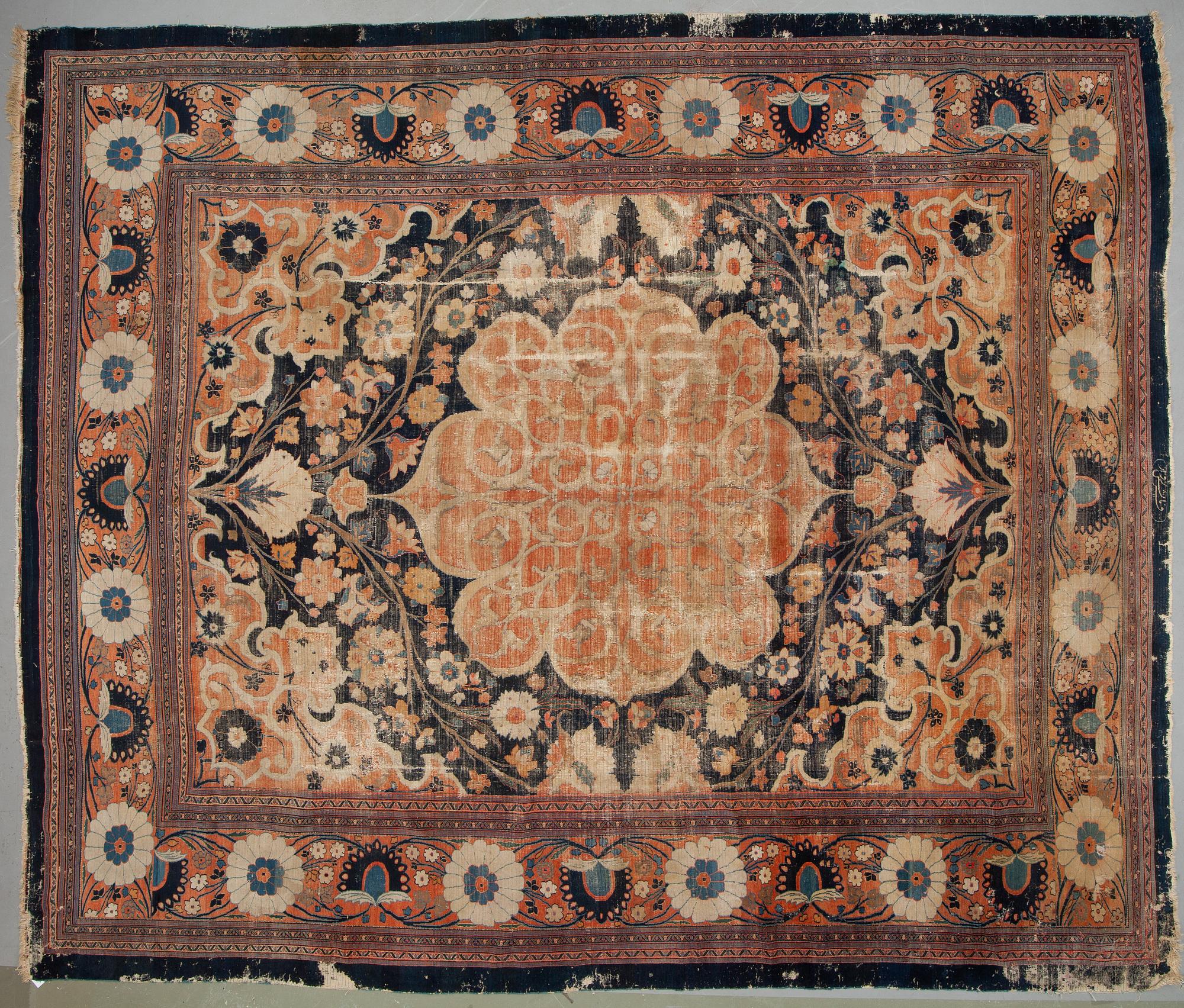 An antique Persian Doroshk carpet, signed, ca 475 x 397 cm.