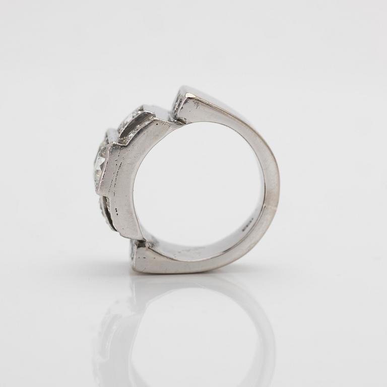 18K white gold ring with diamonds.