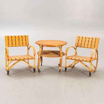 Armchairs a pair and table, 1930s-40s.