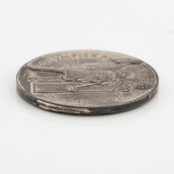 An olympic silver medal from the 1912 Summer Olympics in Stockholm, Sweden.