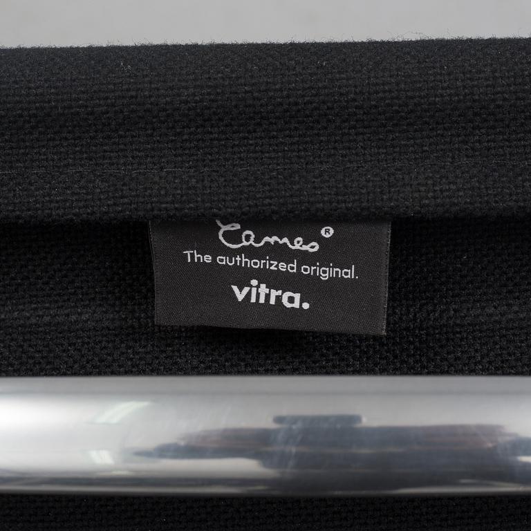 A 'EA 104 Swivel' armchair by Charles & Ray Eames, Vitra, 2016.