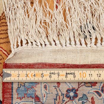 A semi-antique rug, Central Persia, signed (Hosien) Seirafian, c. 166 x 117 cm.