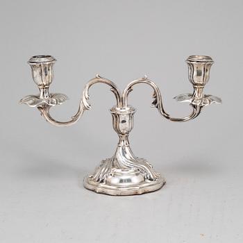 A rococo style silver candelabra, marked CG Hallberg, Stockholm 1928.