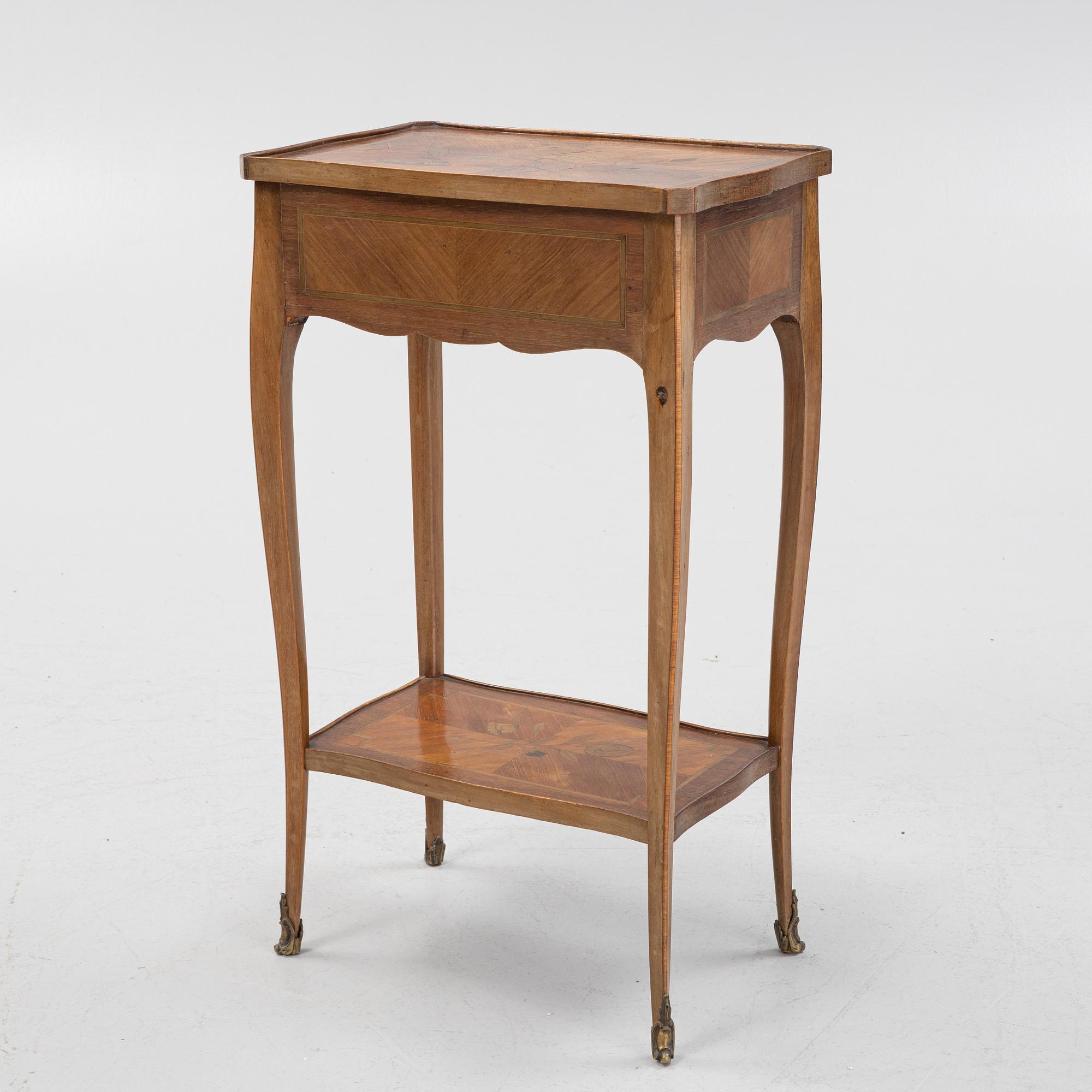 A Louis XV-style Table, circa 1900.