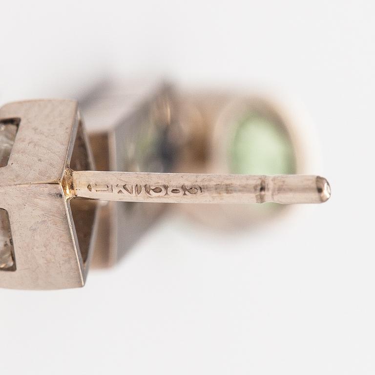 A pair of 14K white gold earrings with diamonds ca. 0.78 ct in total, sapphires and chrysoberylles.