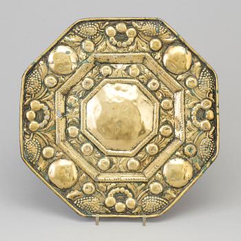 A BRASS DISH, probably 17th century.