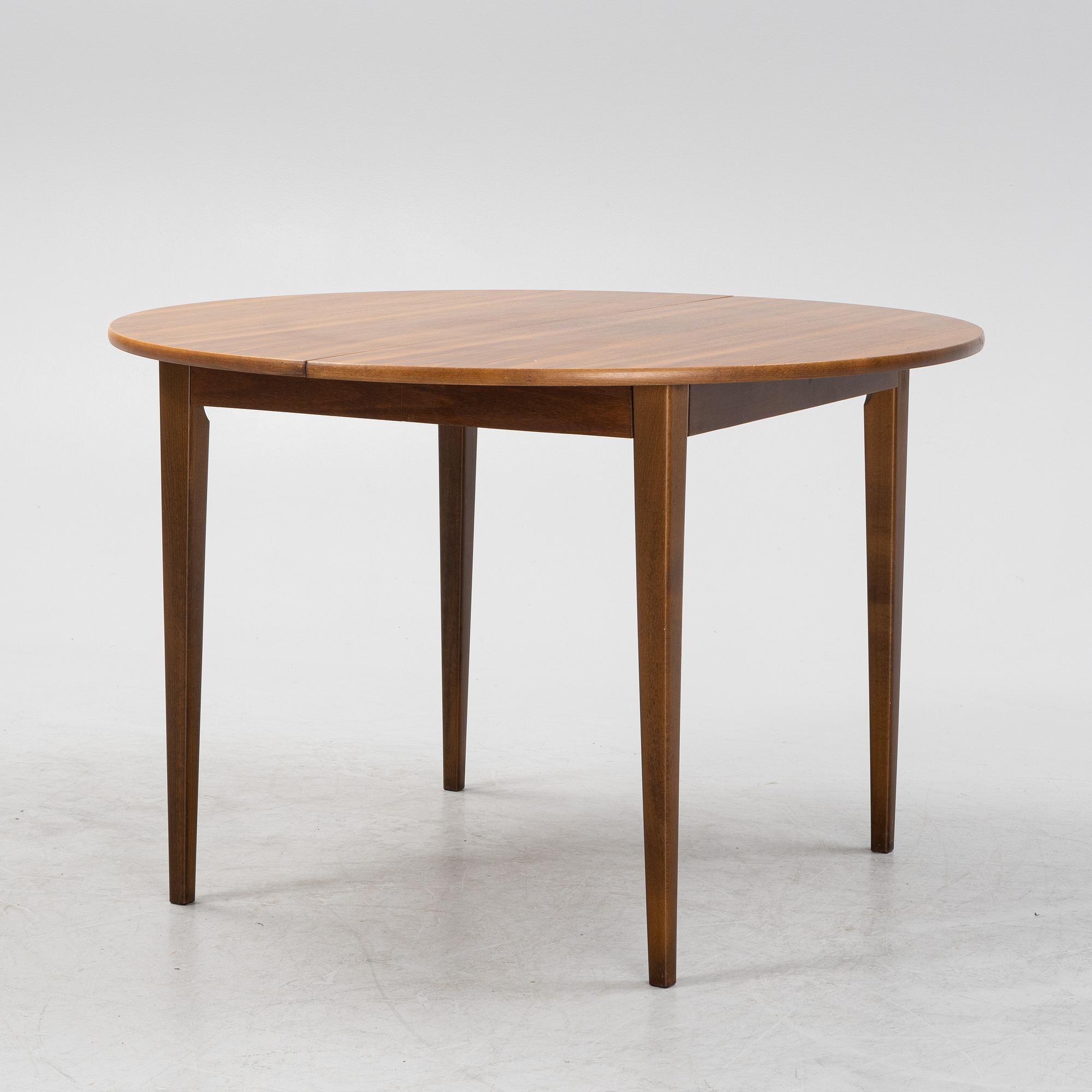A walnut dining table, 1960's.