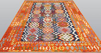 A kilim carpet, ca 290 x 199 cm.