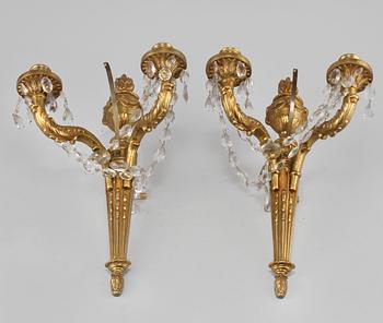 VÄGGLYSTRAR, ett par, omkring 1900-talets mitt.