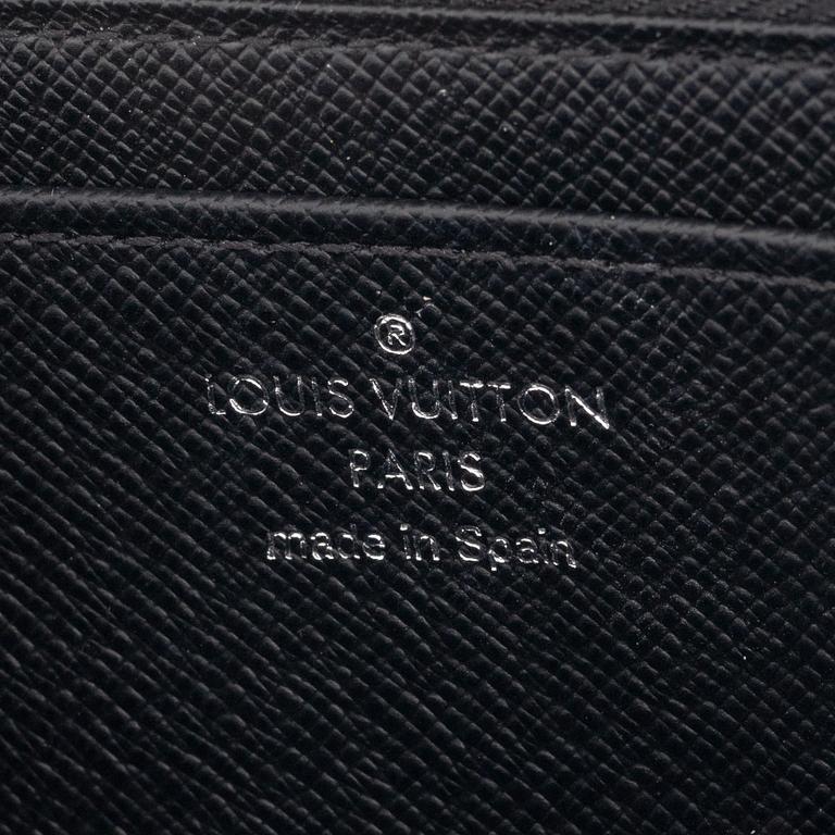 Louis Vuitton, a black Epi wallet, 2015.