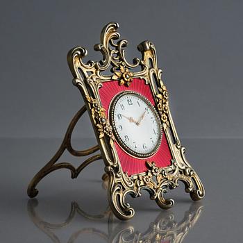 A Fabergé, Nobel family, jewelled, silver-gilt, guilloché enamel desk clock, workmaster Michael Perchin, St Petersburg.