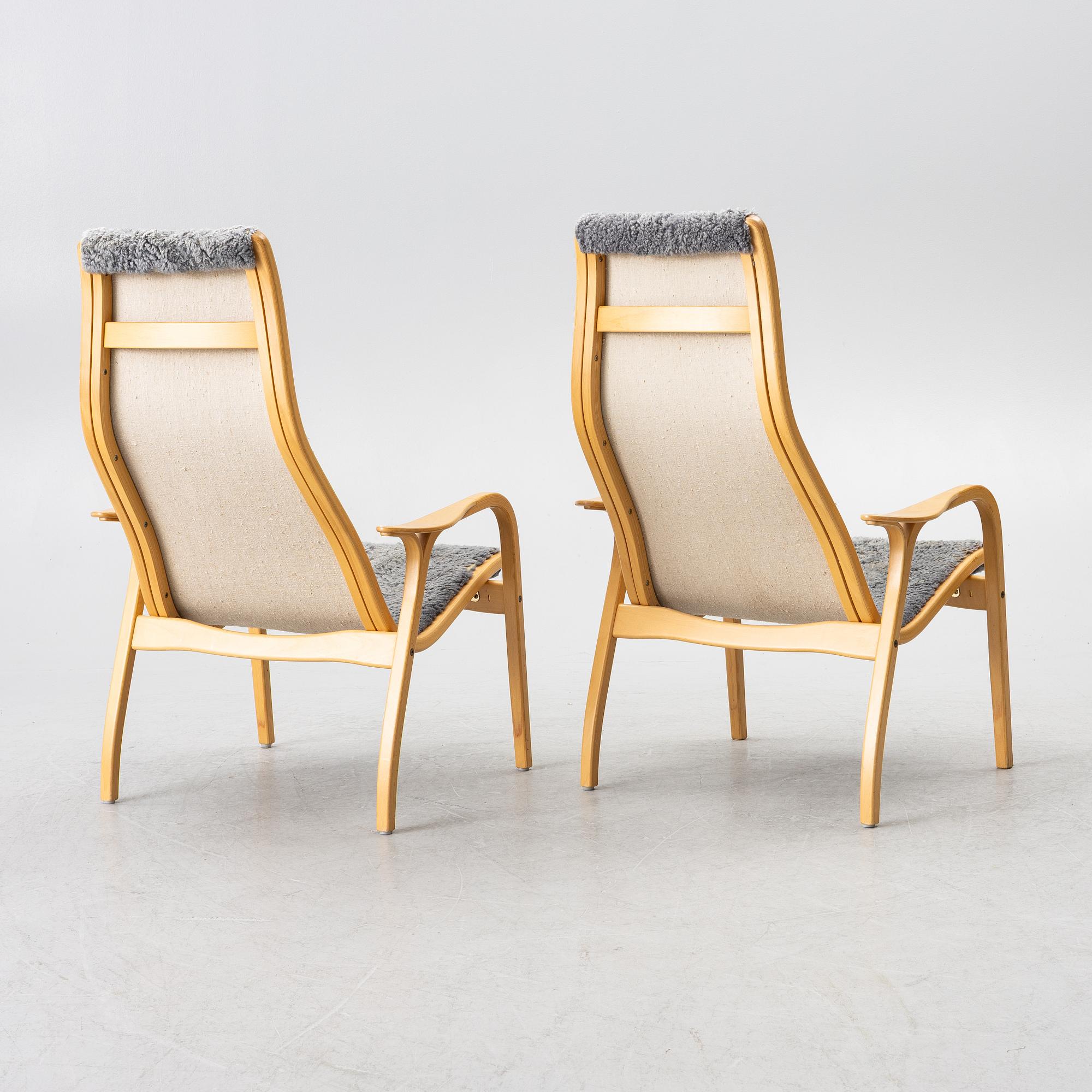 Yngve Ekström, a pair of 'Lamino' easy chairs, Swedese 2004.