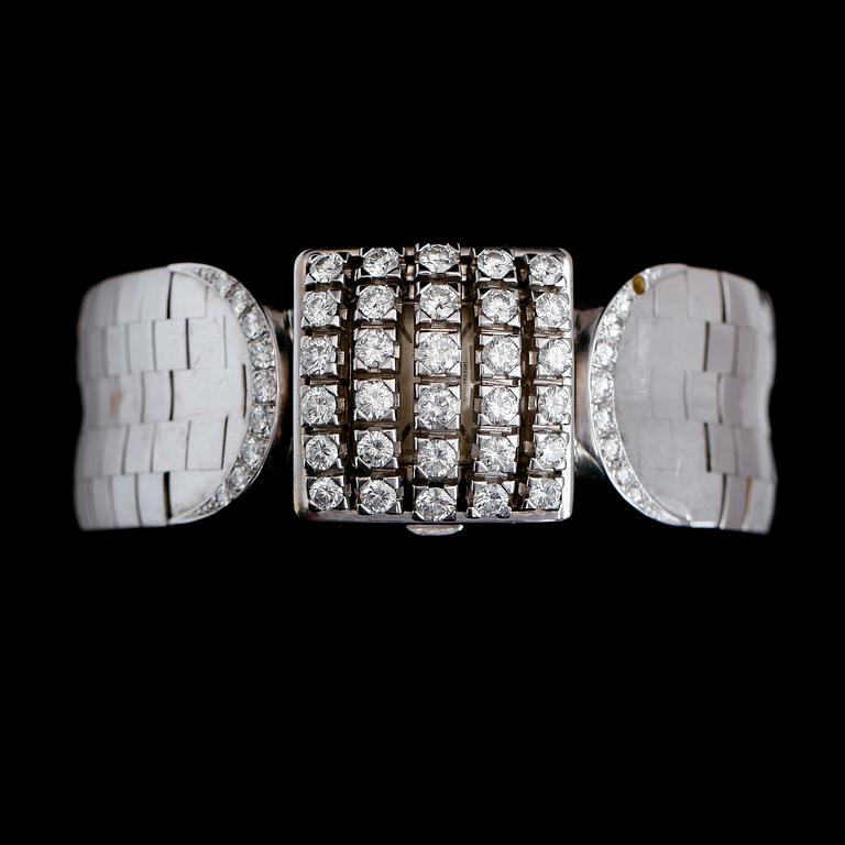 DAMUR, 18K vitguld, IWC, briljantslipade diamanter tot ca 1.50 ct. Tot vikt ca 81 g.