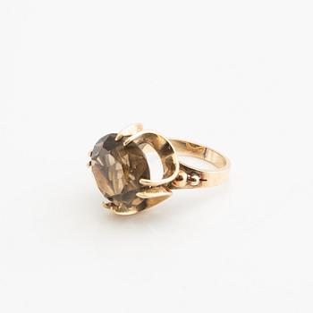 Ring, 18K gold with smoky quartz.