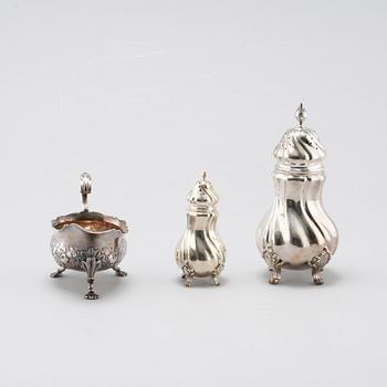 A silver sugar shaker, salt shaker and creamer, 19th-20th century.