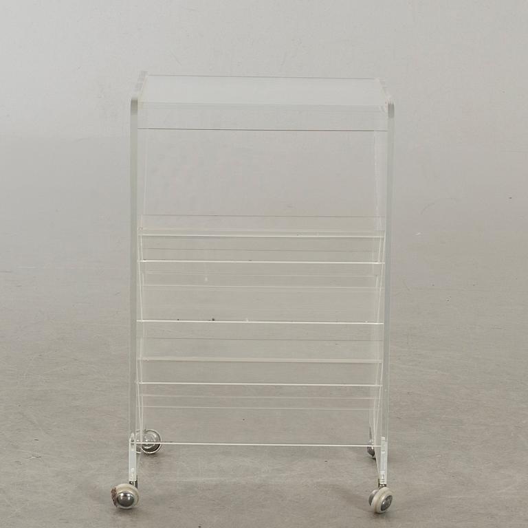 A NEWS PAPER STAND 1970'S.