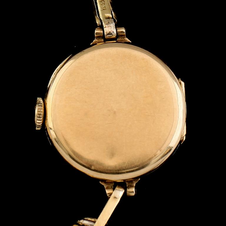 ARMBANDSUR, 18 k guld, 1900-talets första hälft. Total vikt med urhus ca 13 g.