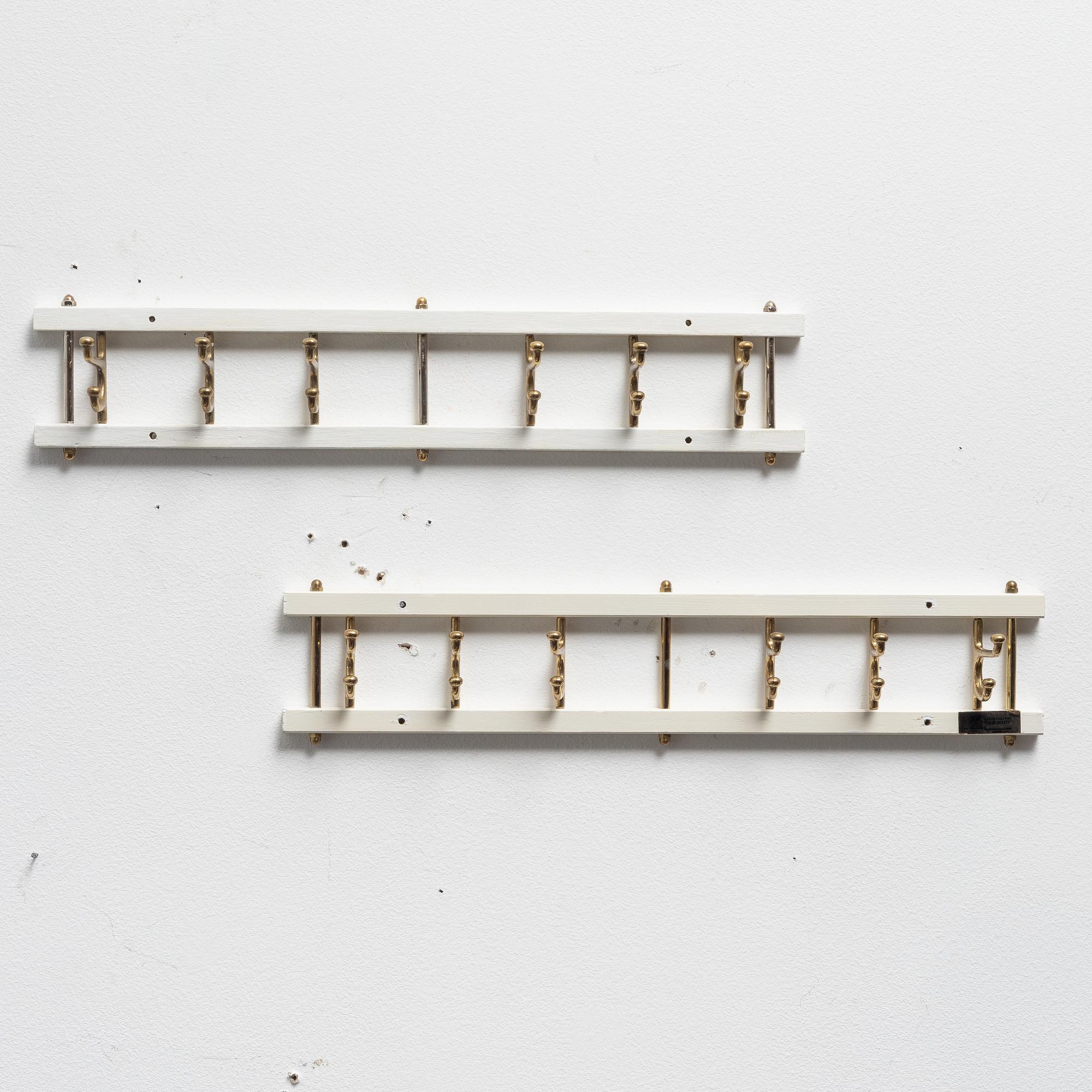 Klädhängare, ett par, "Dekorativ", Skoglunds metallgjuteri, Anderstorp, 1950-/60-tal.