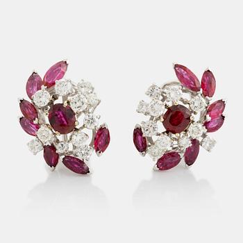 475. A pair of 18K white gold earrings set with faceted rubies and round brilliant-cut diamonds.