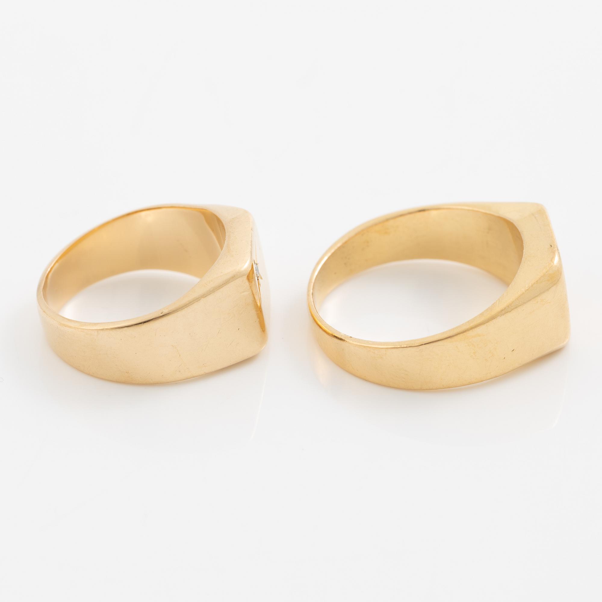 Two rings 18K gold.