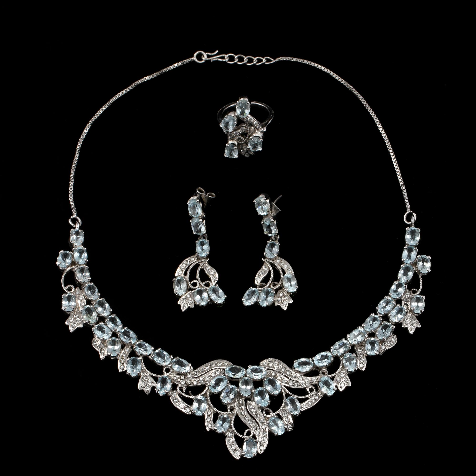 GARNITYR, 3 delar, sterlingsilver med fasettslipade stenar, sekelskifte 1900/2000-tal. Vikt 63 g.