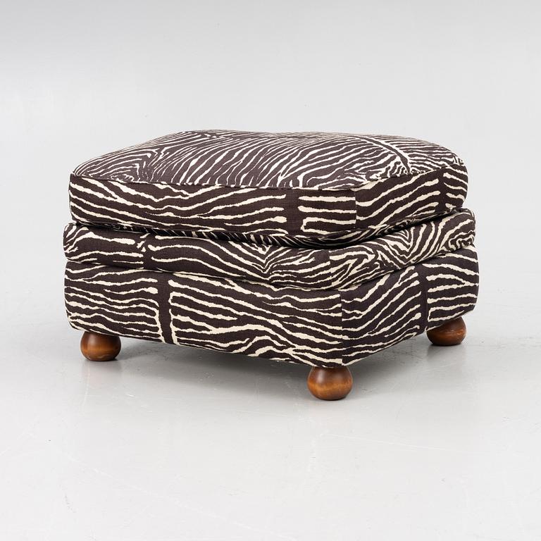 Josef Frank, a model 336 ottoman, Svenskt Tenn.