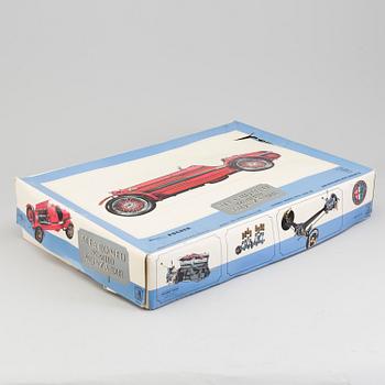 A plastic and metal model of an 1931 Alfa Romeo 8 C by Pocher.