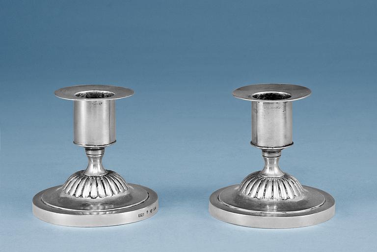 A PAIR OF CANDLESTICKS.