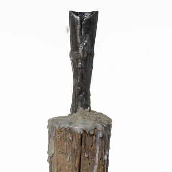 A candle stick, 19th/20th Century.