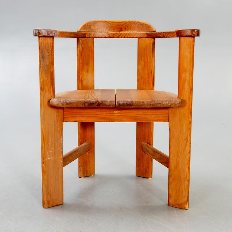 A 1960/70s pine armchair.