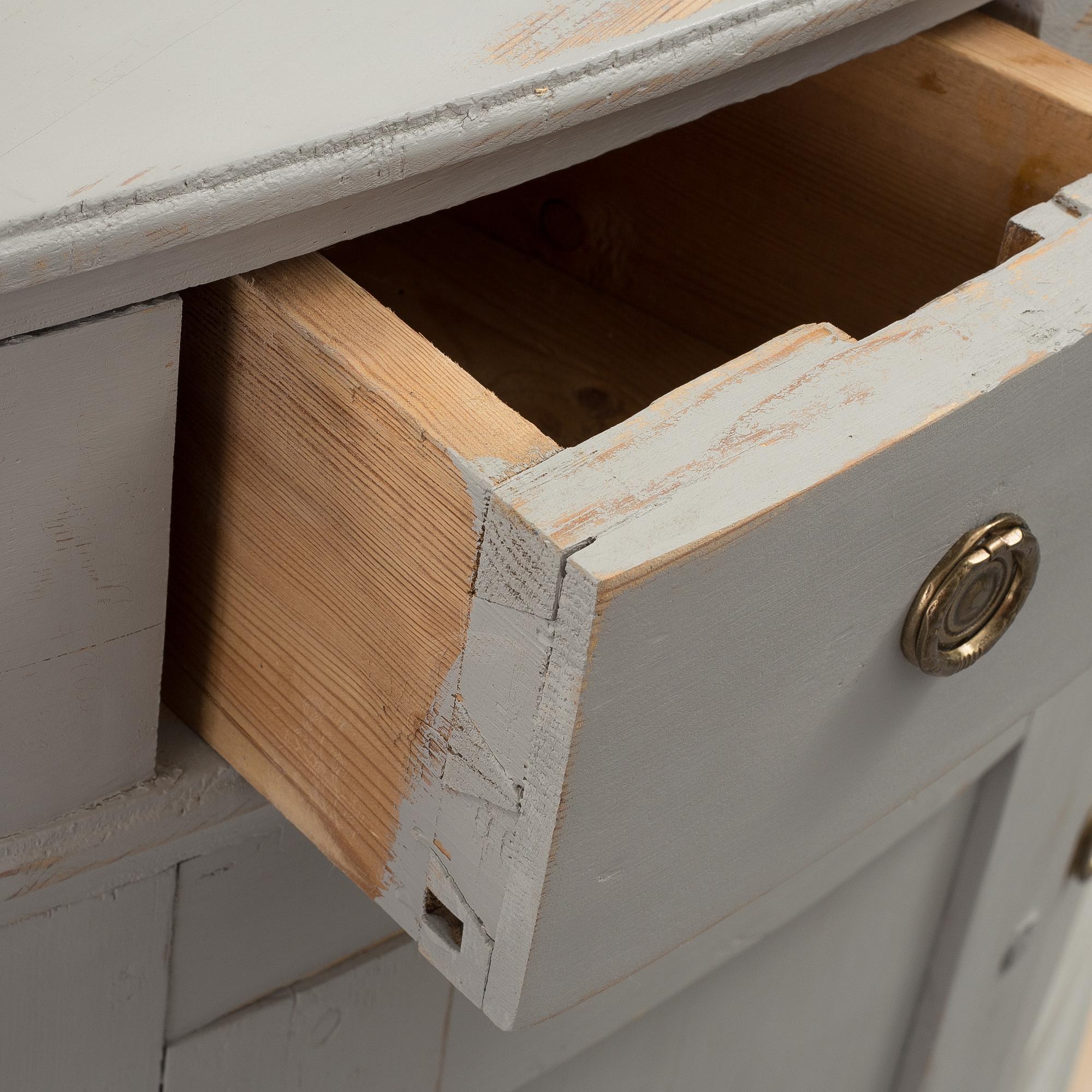 A mid 19th century corner sideboard.