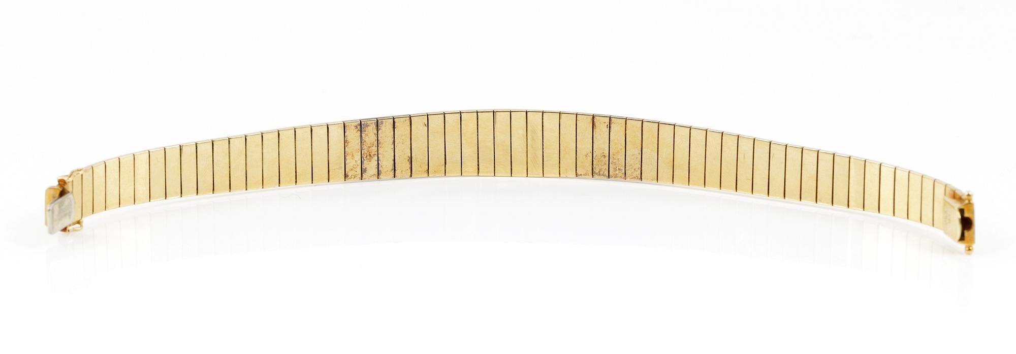 ARMBAND, guld 18K, sju små diamanter, stämplad CB, Europa 1900-talets andra hälft. Vikt ca 40 gram.