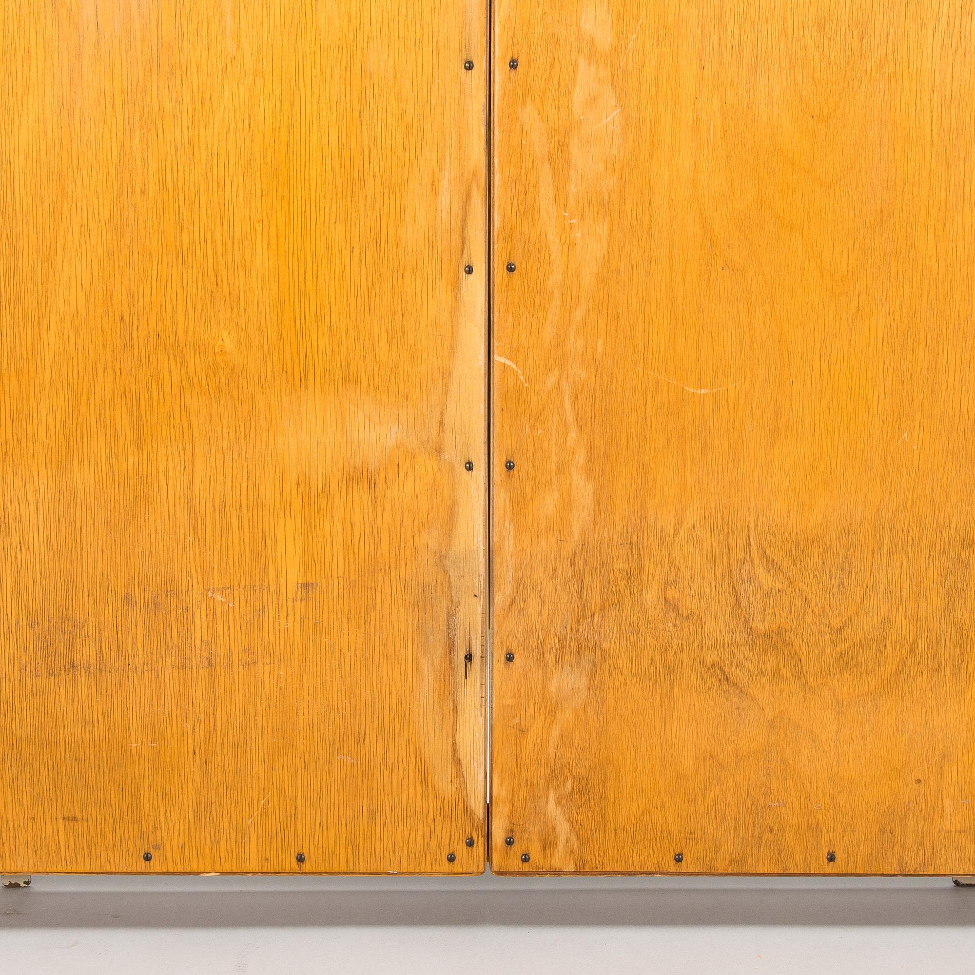 A 1950s three-part dressing mirror.