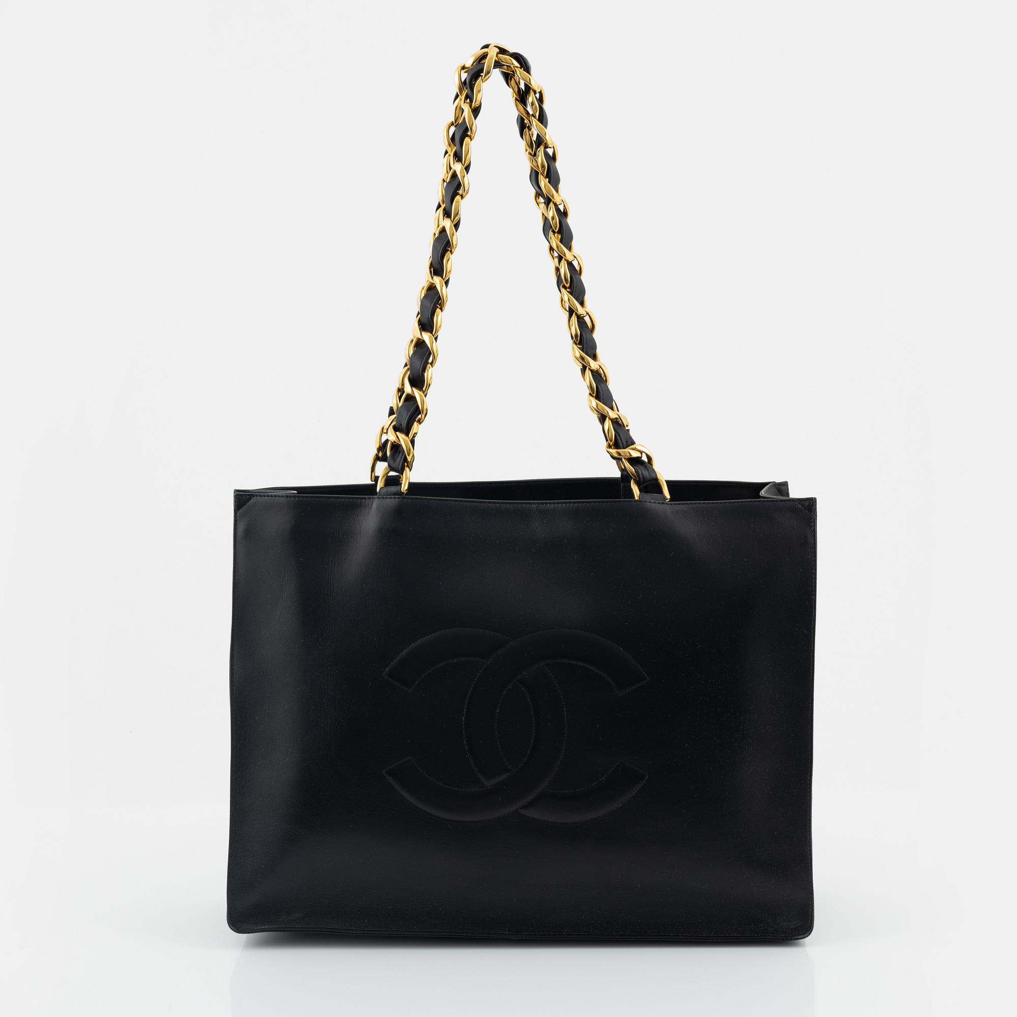 Chanel, a black leather and gold tone chain 'Shopper', 1991-1994.