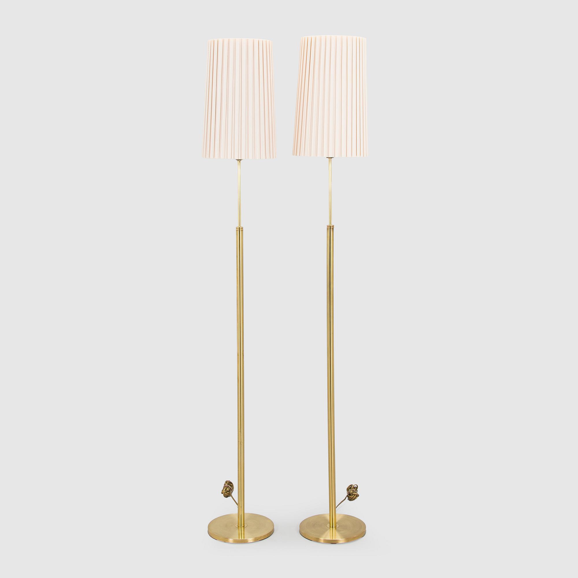A pair of late 20th century floor lamps.