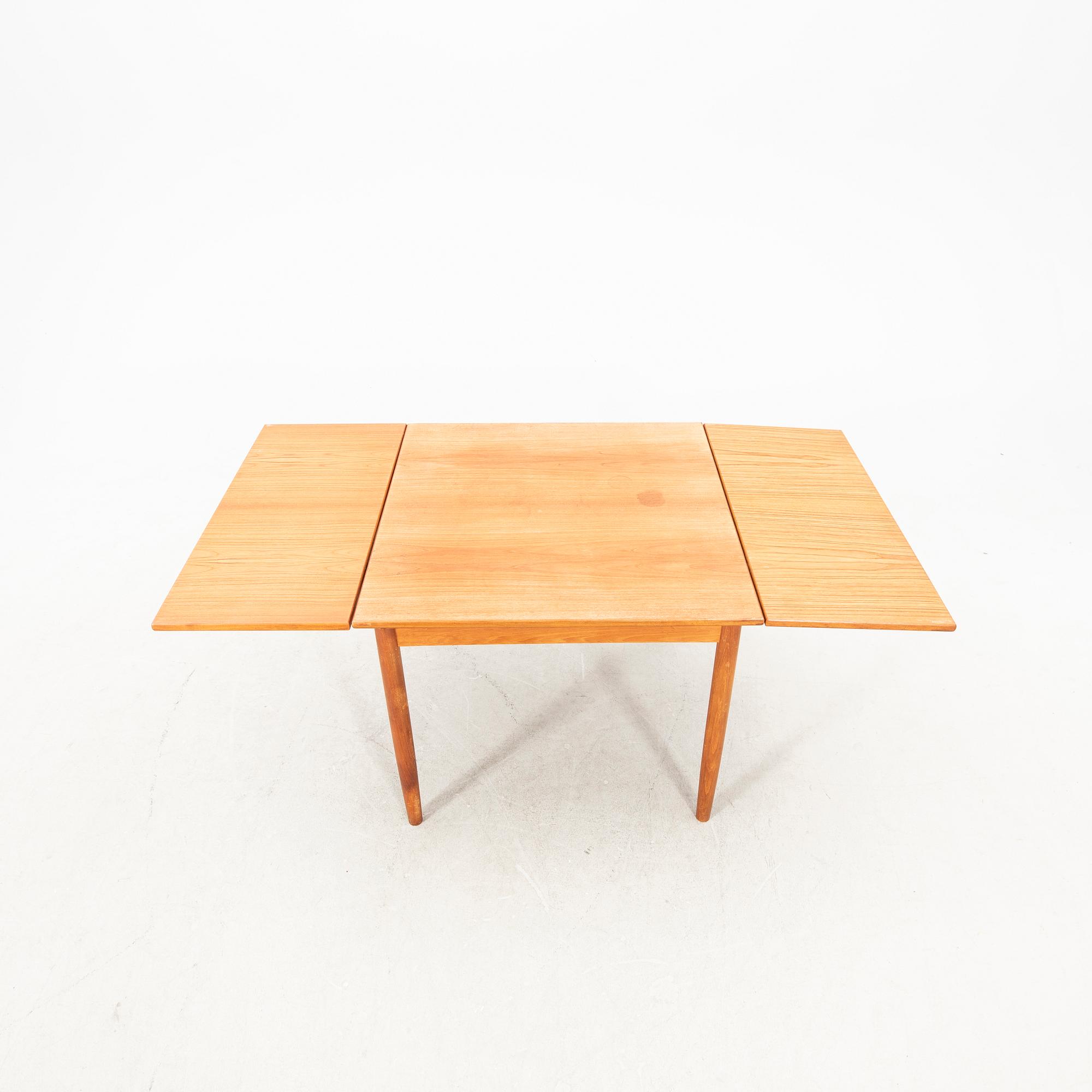 A teak table from the middle of the 20th century.