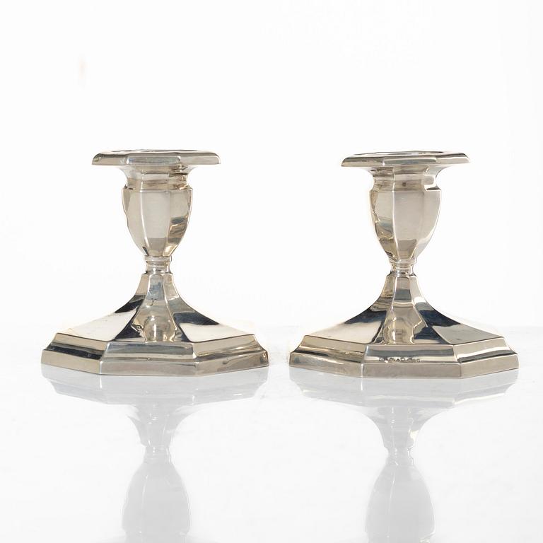 A pair of silver candelsticks, GAB, 1928.
