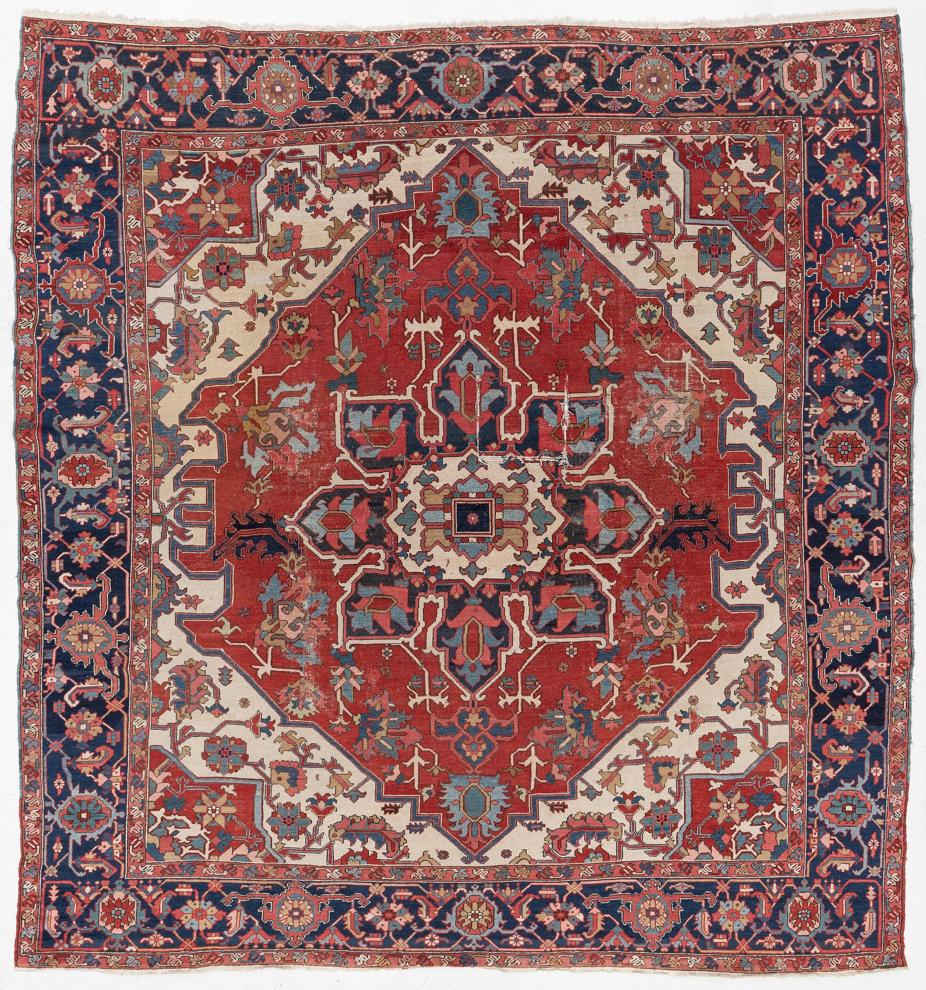 An Antique north west persian carpet, c. 325 x 313 cm.