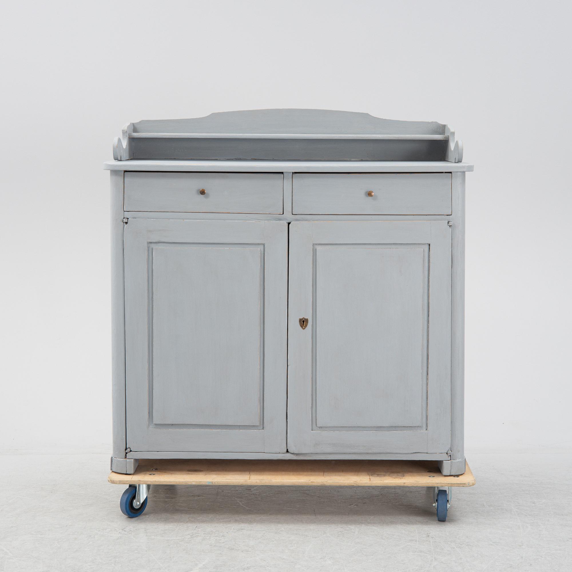 A painted cupboard, first half of the 19th Century.