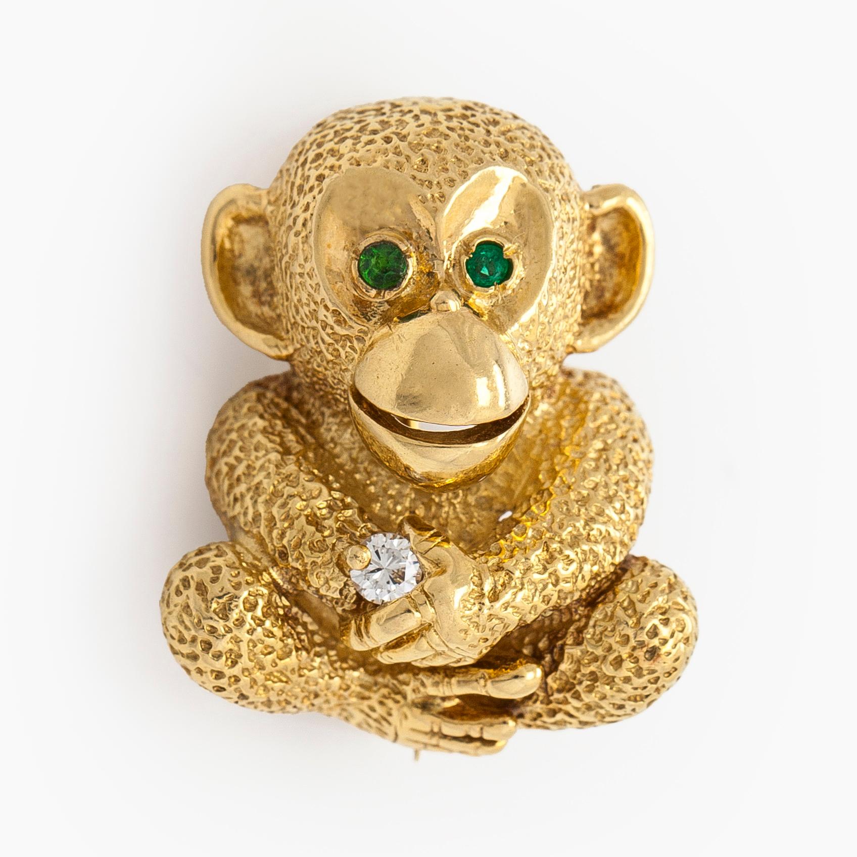 Brooch, 18K gold, diamond and emeralds.