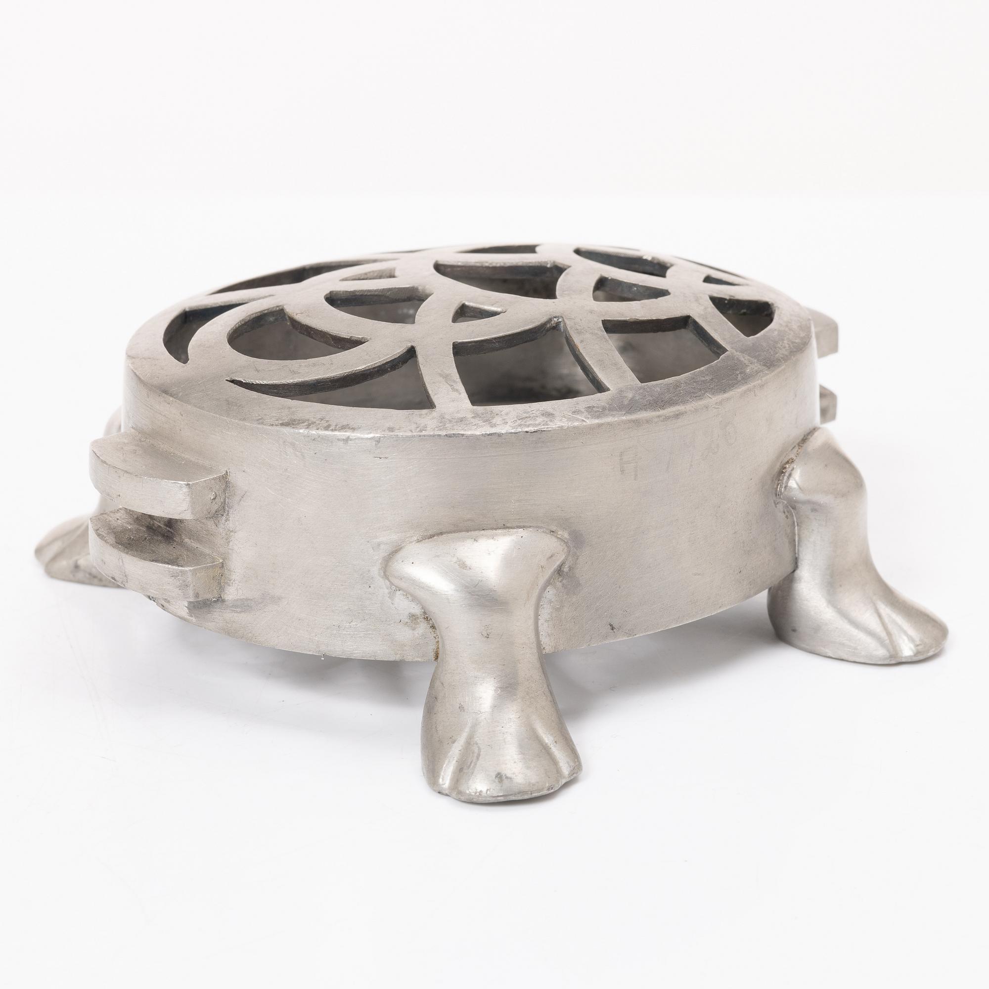 Firma Svenskt Tenn, a pewter flowerstand in the shape of a tortoise,  model no. A 1081, probably 1930s.
