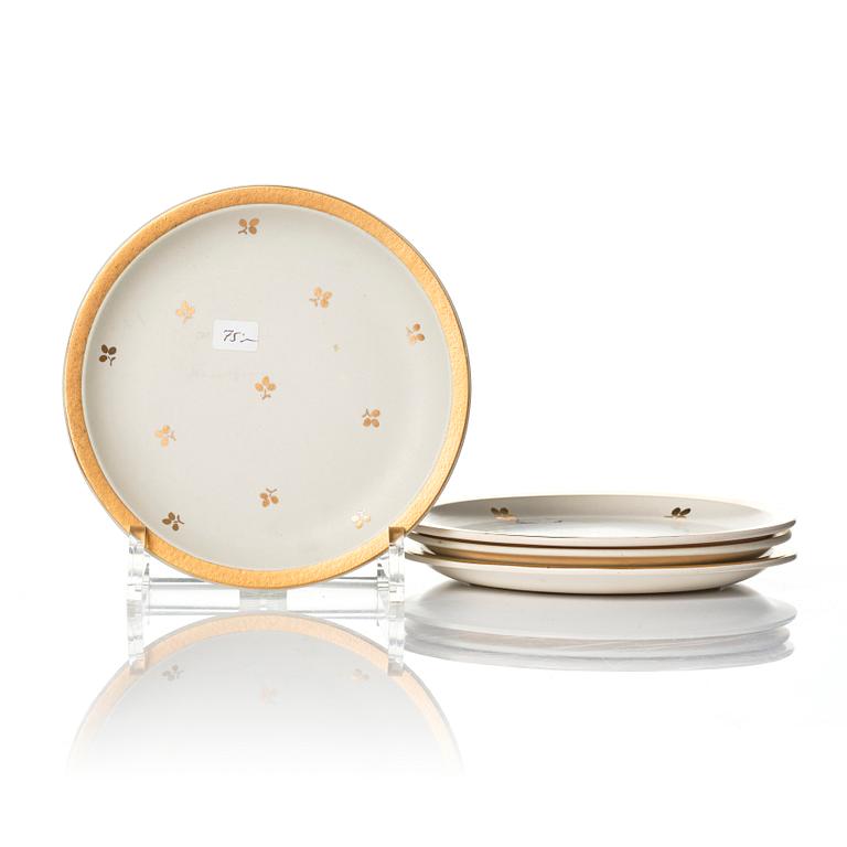 Wilhelm Kåge, 15 pieces of "Carrara" and "Gold Carrara" stoneware dishes, Gustavsberg, Sweden, 1930s/40s.