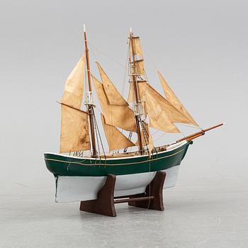 A model of a ship, mid 20th century.