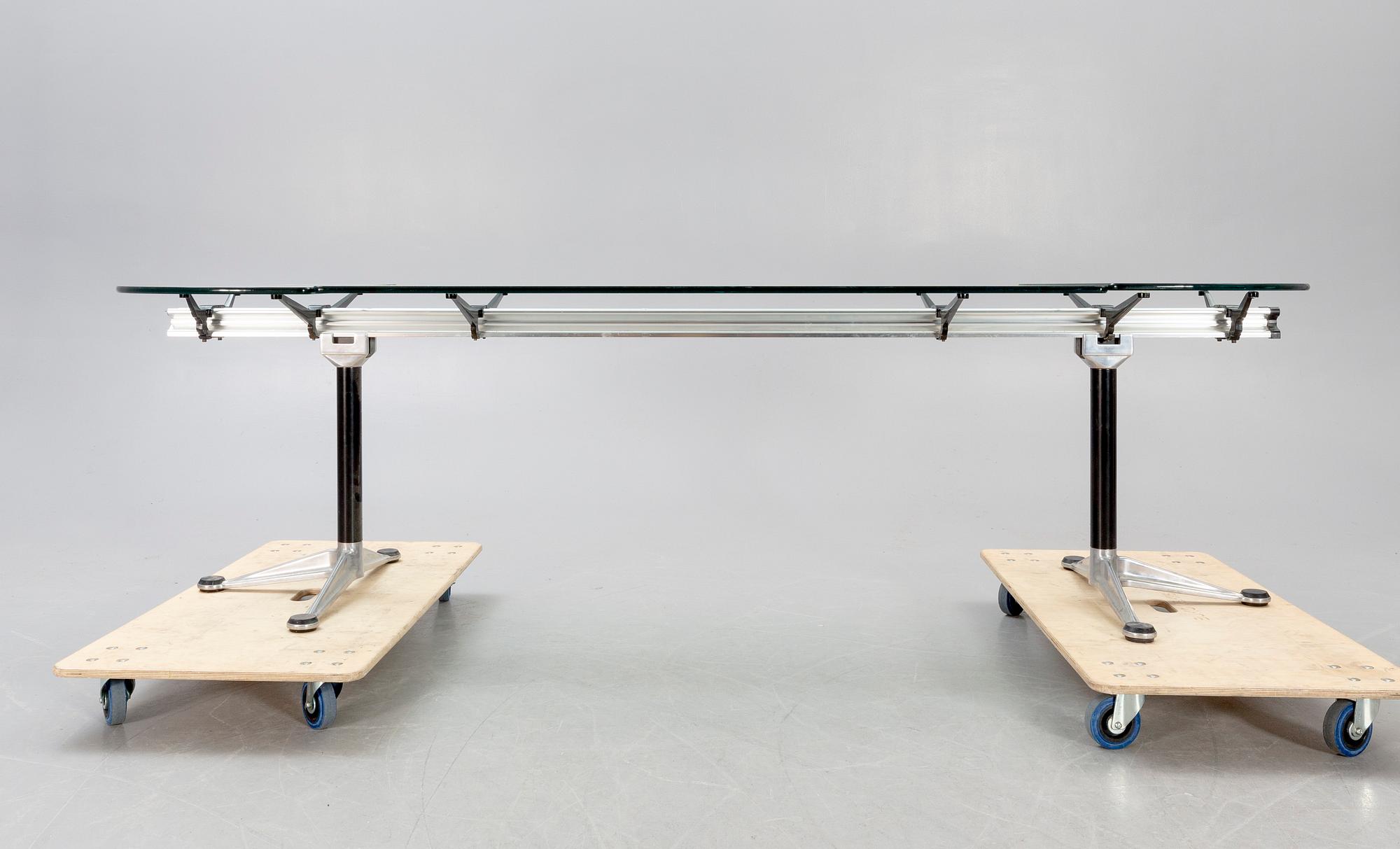 A Bruce Burdick 1980s glass and metall table for Herman Miller/Burdicks groups.