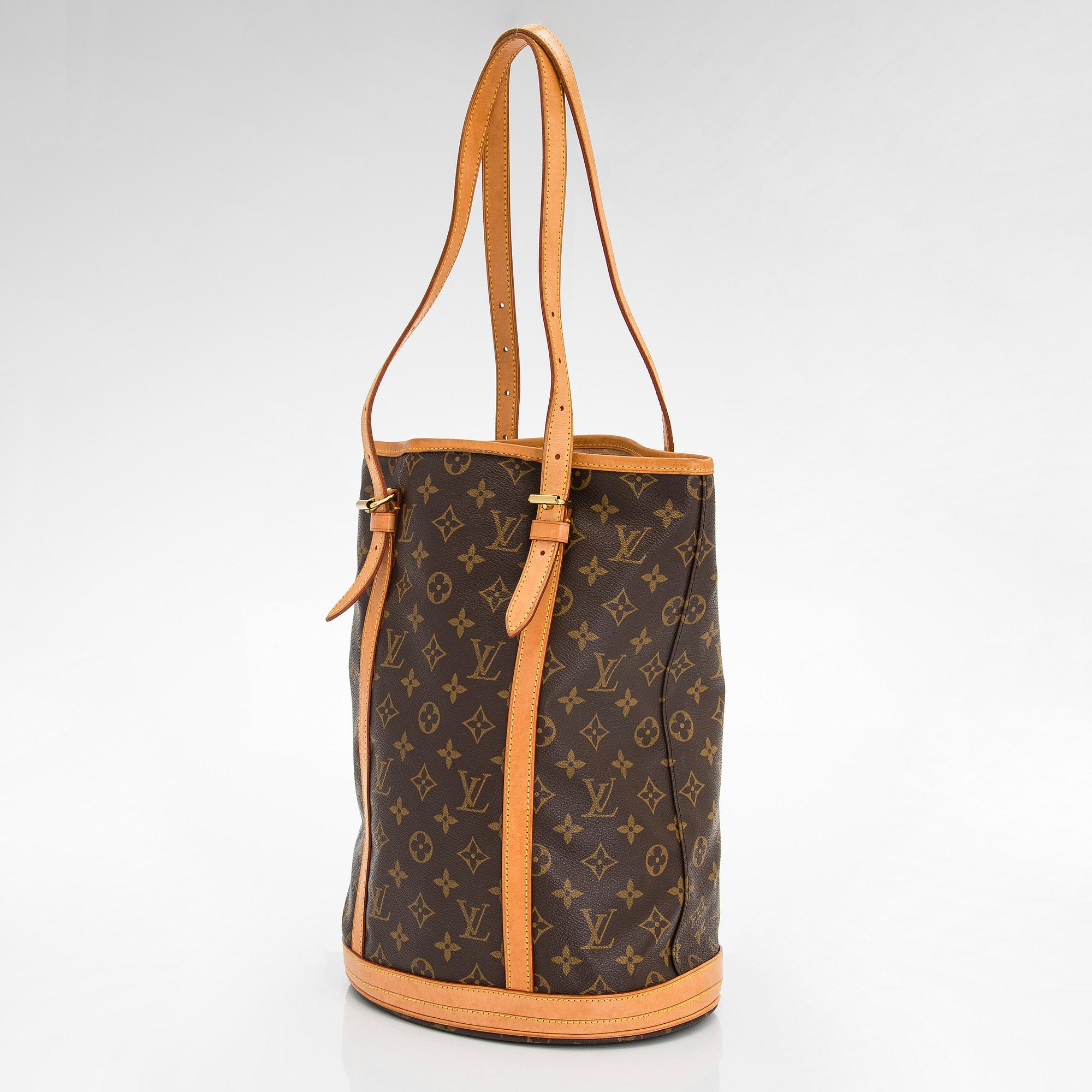 Louis Vuitton, a Monogram Canvas "Bucket" bag and pochette.