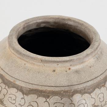 A Chinese glazed stoneware jar, probably Ming dynasty (1368–1644).