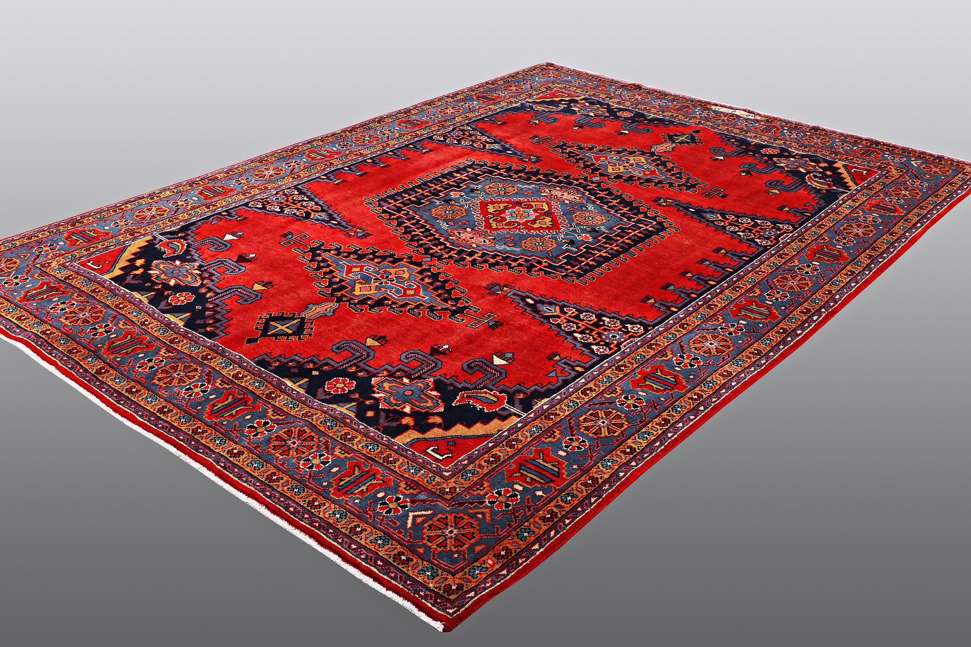 A CARPET, Wiss Signed Sharbani.  327 x 227 cm.