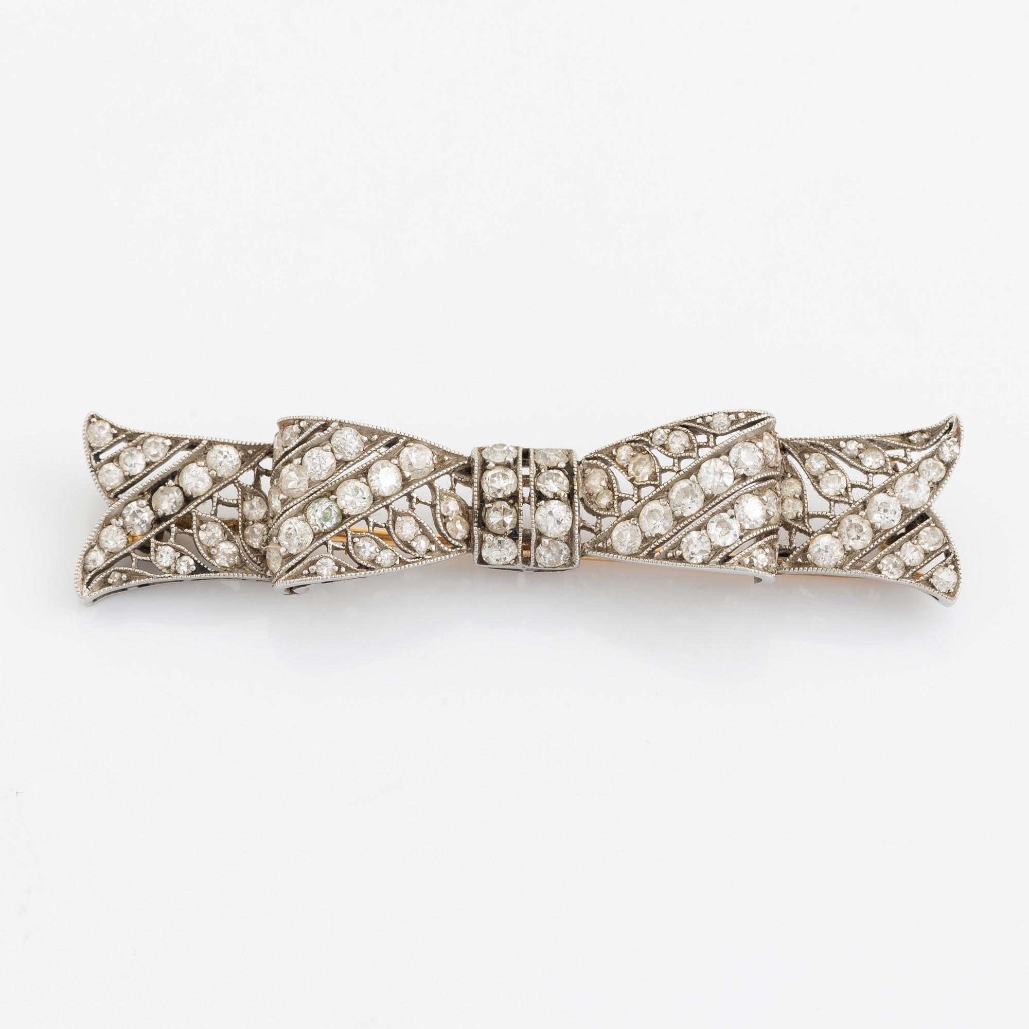 Old cut diamond bow brooch.