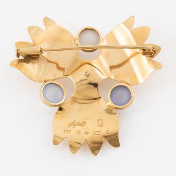 Brooch 18K gold with a cultured pearl and blue stones likely chalcedony, Stigbert.