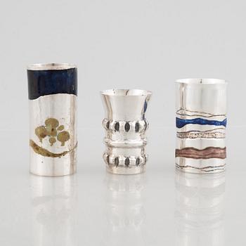 Three sterling silver miniature beakers/vases, marks of Lars Arby, Gothenburg, Sweden 1977-1982.